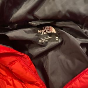 Women’s size M North Face red jacket